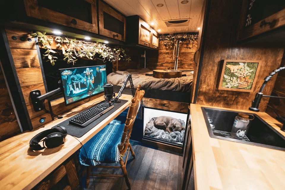 This small gaming room setup is different from the others - given that it’s in a van. A cool trick used here is having the monitor arm be foldable to let the space easily act as a multifunctional surface to study, eat, or even chop vegetables!