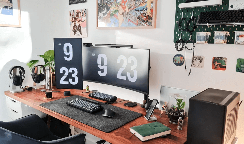 There is definitely a theme with these cozy gaming setups - they all have a color palette of greens, whites, warm oranges, and browns. This is a great inspiration for any casual gamer looking to create a PC gaming setup.